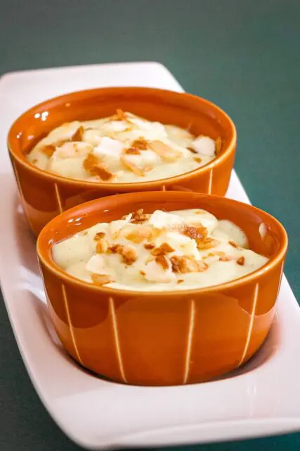 vanilla pudding with toasted coconut flakes