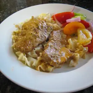 veal steaks on noodles