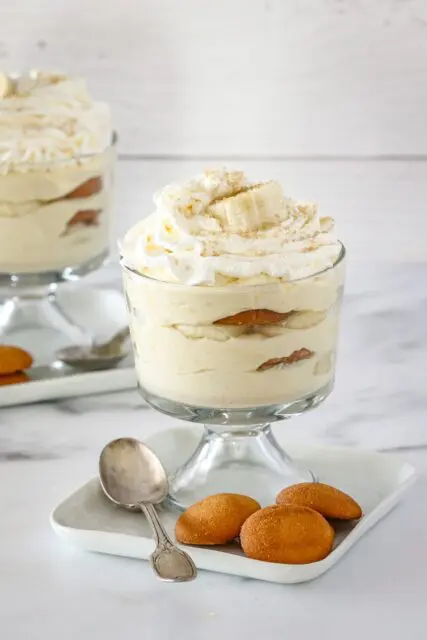 freshly whipped cream on banana pudding