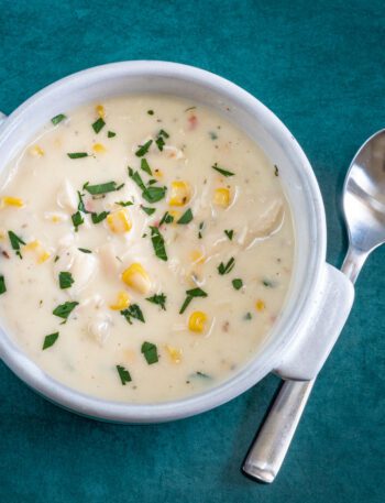 20 minute chicken chowder with corn and parsley garnish in a bowl