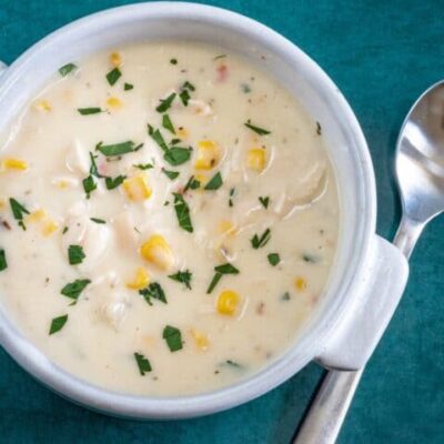 20 minute chicken chowder with corn and parsley garnish in a bowl