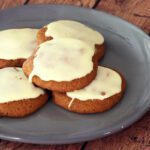 brown butter glazed applesauce cookies on a plate