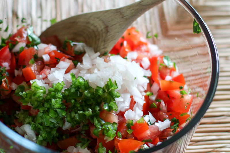 Making fresh salsa.