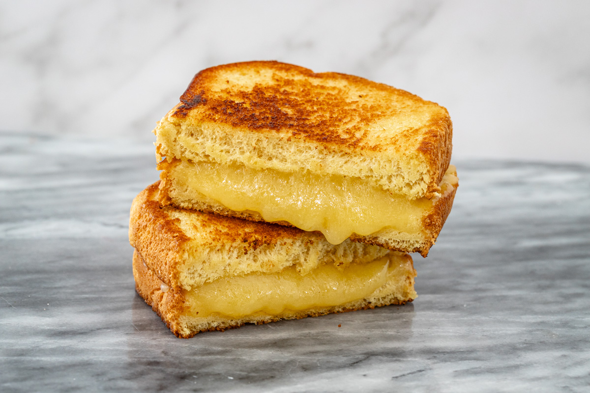 Grilled cheese with melting cheese filling.