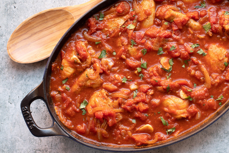 Chicken kapama closeup shot overhead.