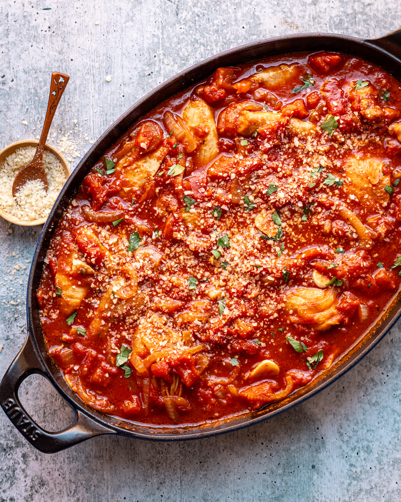 Chicken kapama in a baking dish.