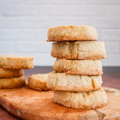 A stack of citrus cardamom sable shortbread cookies.
