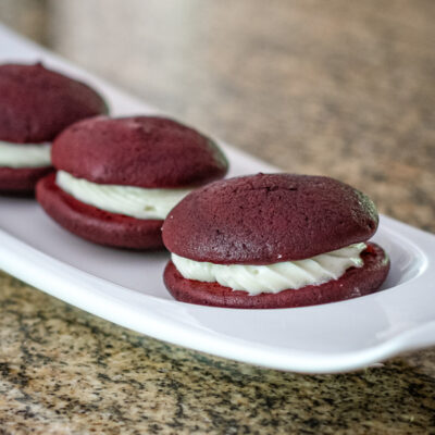 red velvet whoopie pies on a small serving tray