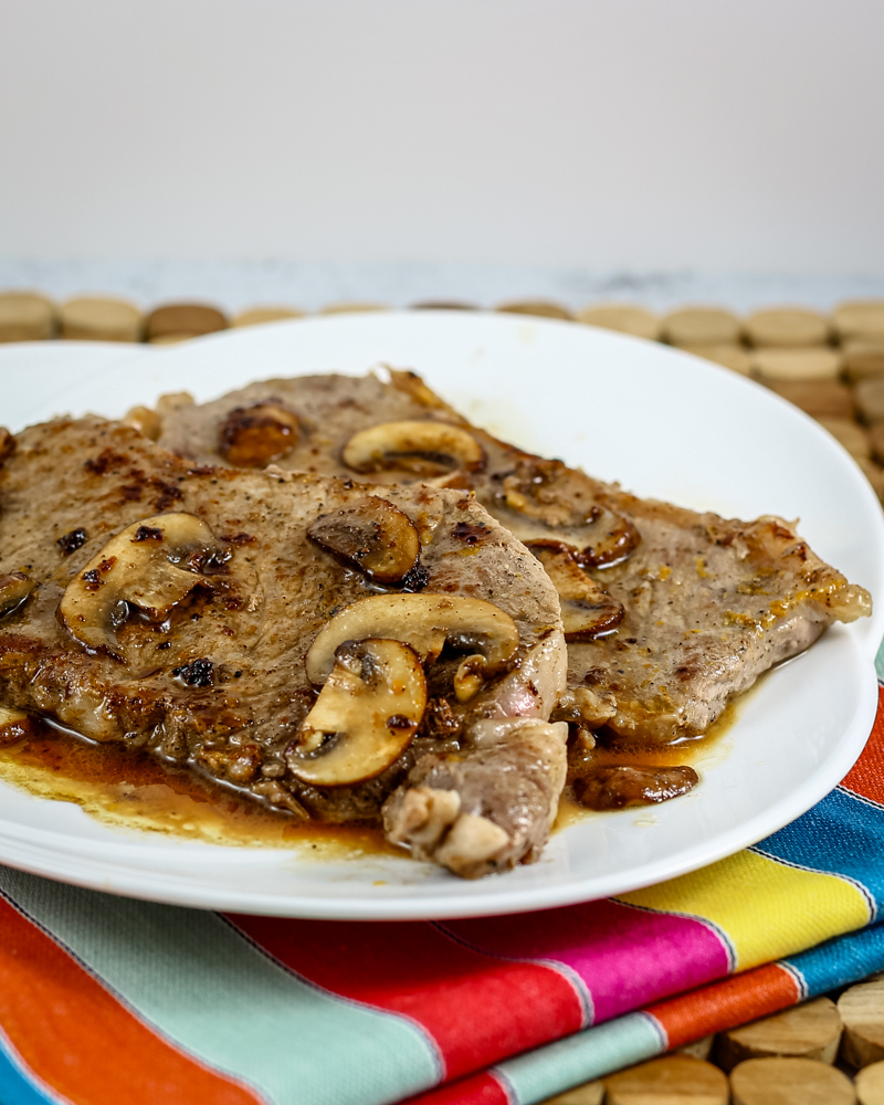 Steak Diane with sauce on a serving platter