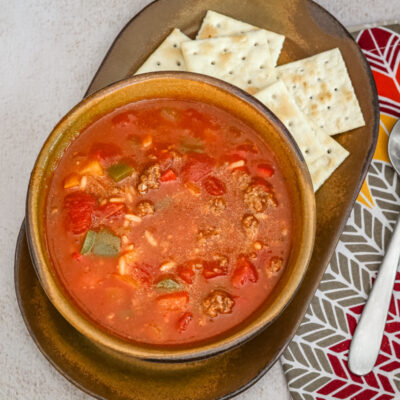 Stuffed pepper soup with ground beef, rice, and tomatoes.