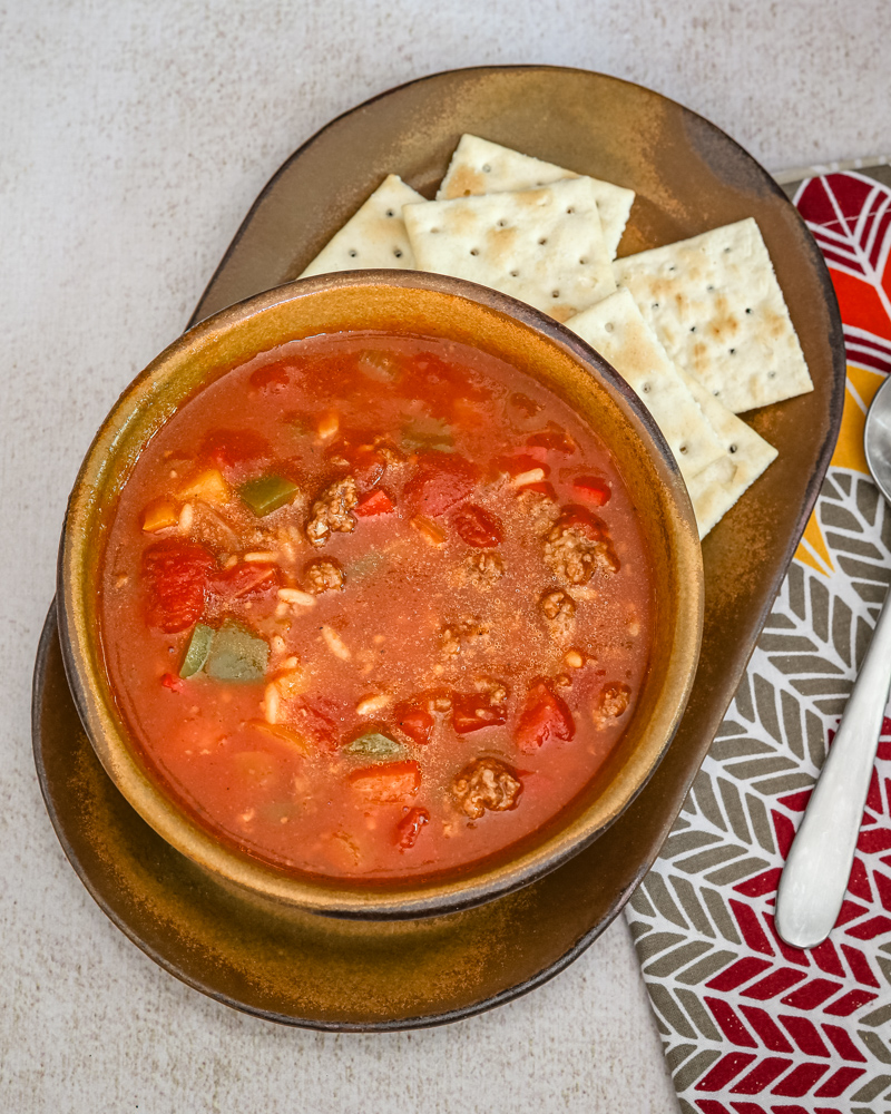 Stuffed pepper soup with ground beef, rice, and tomatoes.