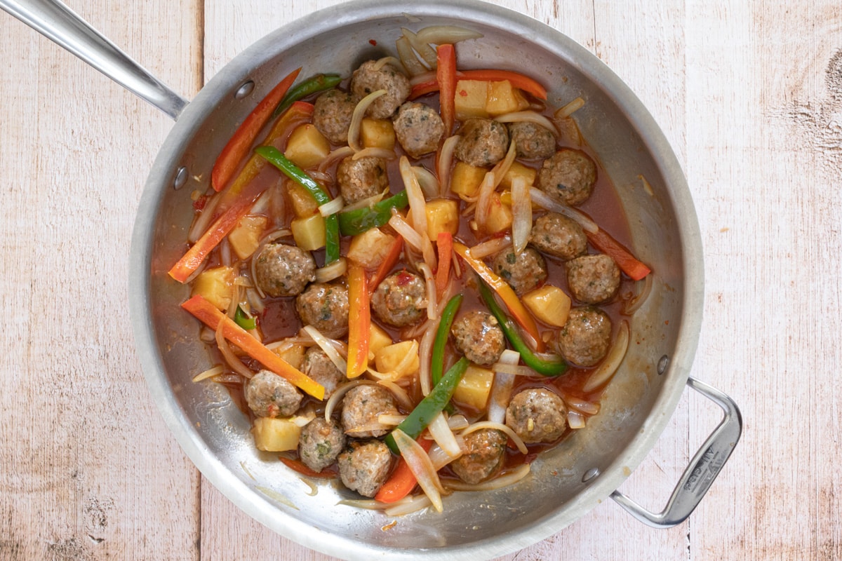 A pan of sweet and sour pork meatballs.