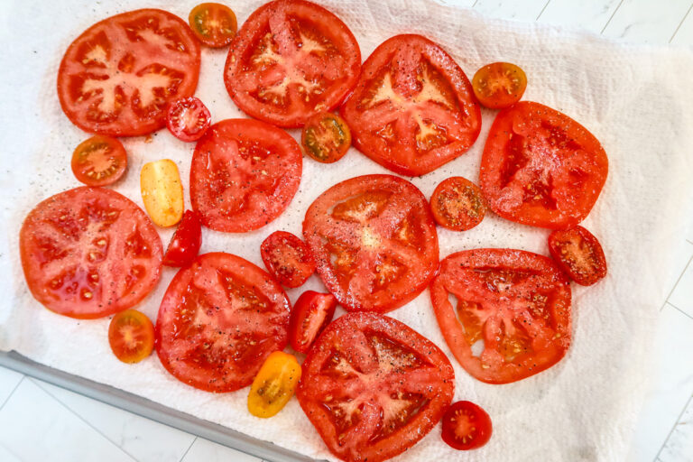 Tomato tart prep: tomatoes on paper towels.