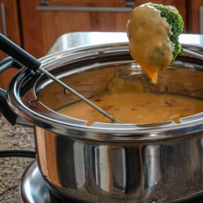 A retro cheese fondue with roasted red pepper