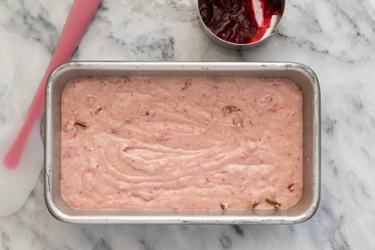 Cranberry sauce bread batter in the pan.