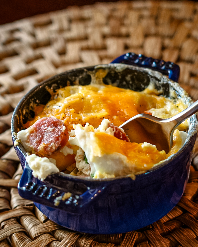 Breakfast casserole with eggs and sausage in a mini cocotte