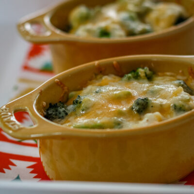 Broccoli, rice, and cheese casseroles baked in mini cocottes