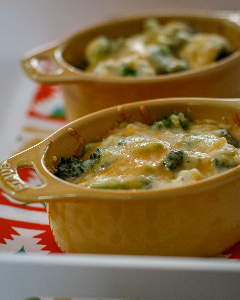 Broccoli, rice, and cheese casseroles baked in mini cocottes