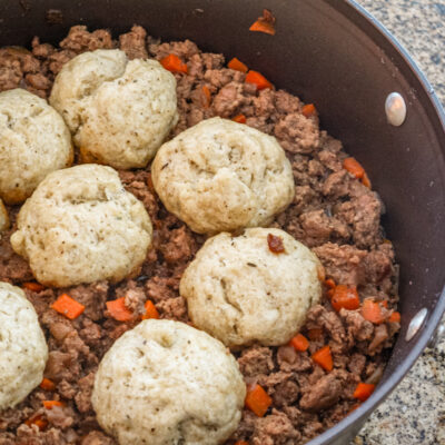 Mince and dumplings in a skillet