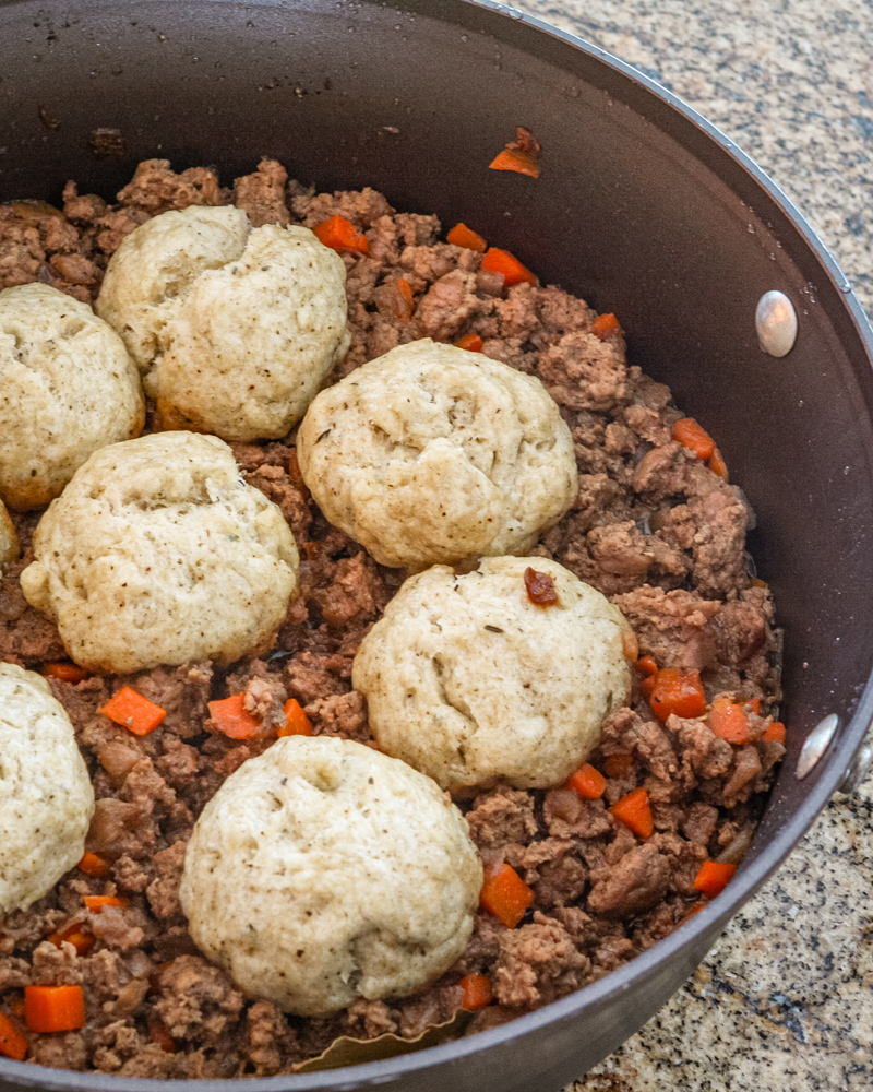 Mince and dumplings in a skillet