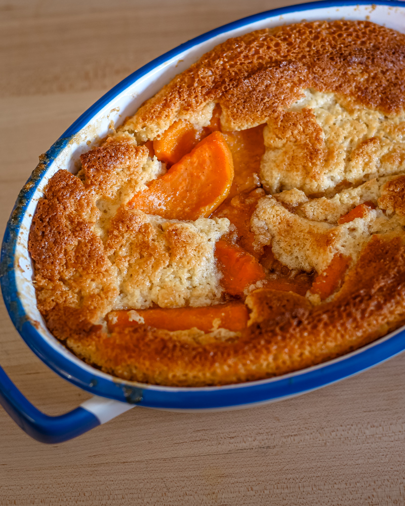 A sweet potato cobbler in the baking dish.