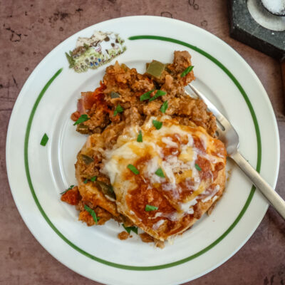 tex mex beef and biscuits baked with biscuits and cheese topping