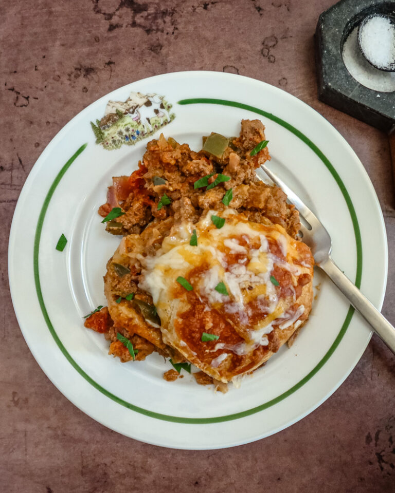 tex mex beef and biscuits baked with biscuits and cheese topping