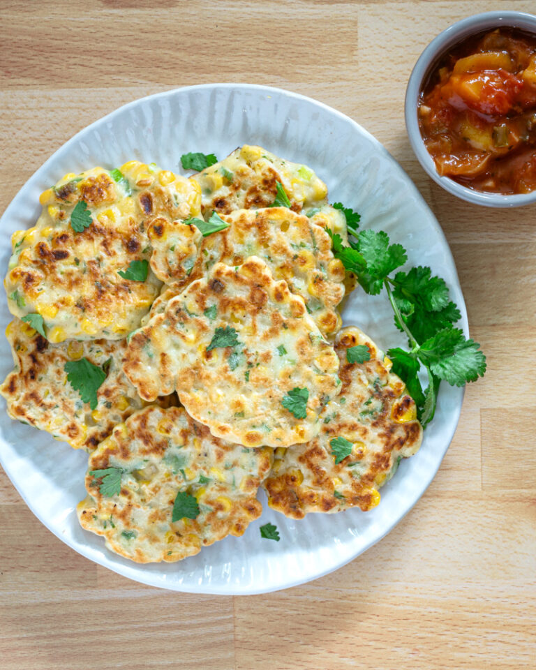 tex mex fritters on a plate with cilantro