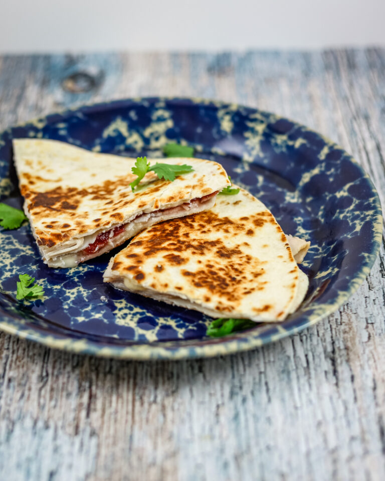 Leftover turkey quesadilla with cranberry sauce and brie.