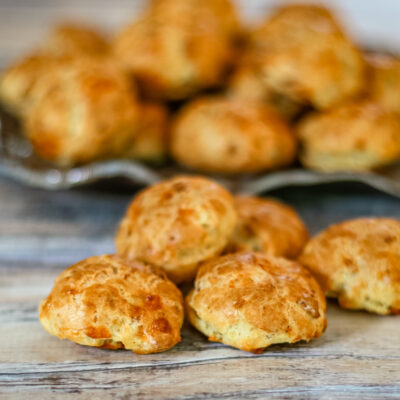 Cheese and bacon puffs on a plate.