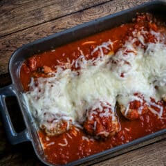 chicken parmigiana in a baking dish