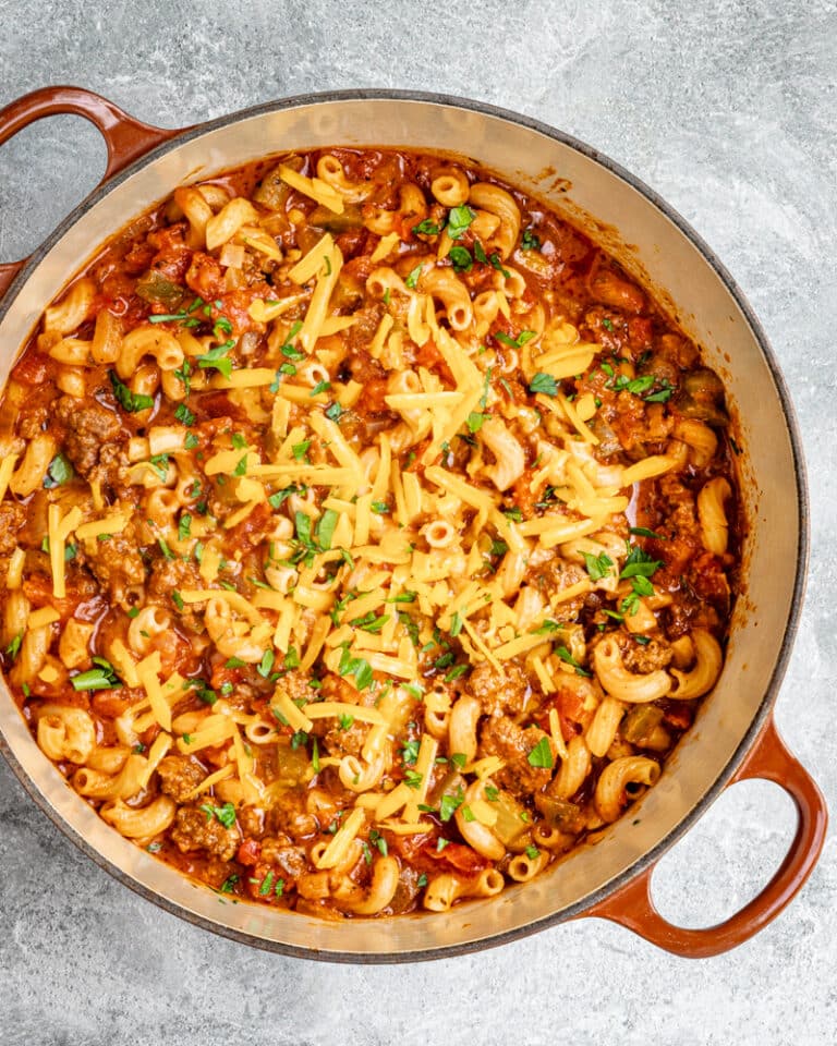 A pot of classic American style goulash with cheese topping.