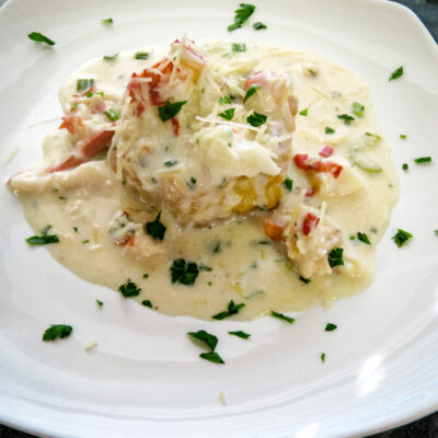 Creamed lobster arranged on puff pastry shells.
