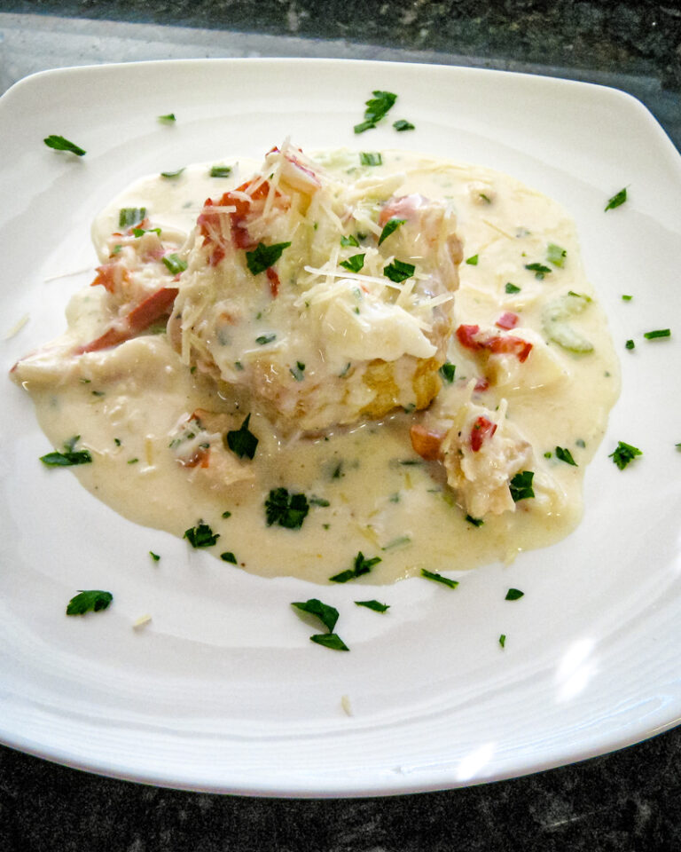 Creamed lobster arranged on puff pastry shells.