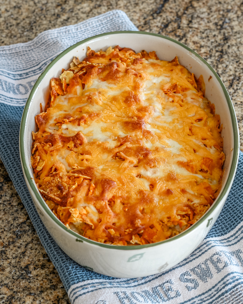 A Dorito casserole in the baking dish.
