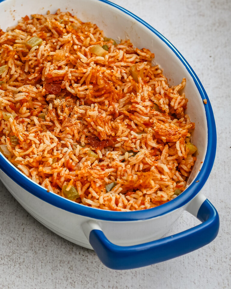 A serving dish with Spanish rice.