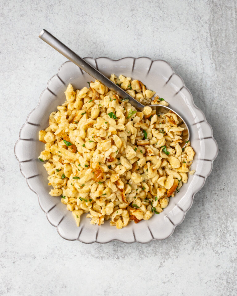 A plate of homemade spaetzle sautéed with butter.
