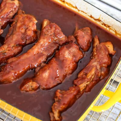 Pork spareribs in a baking pan.