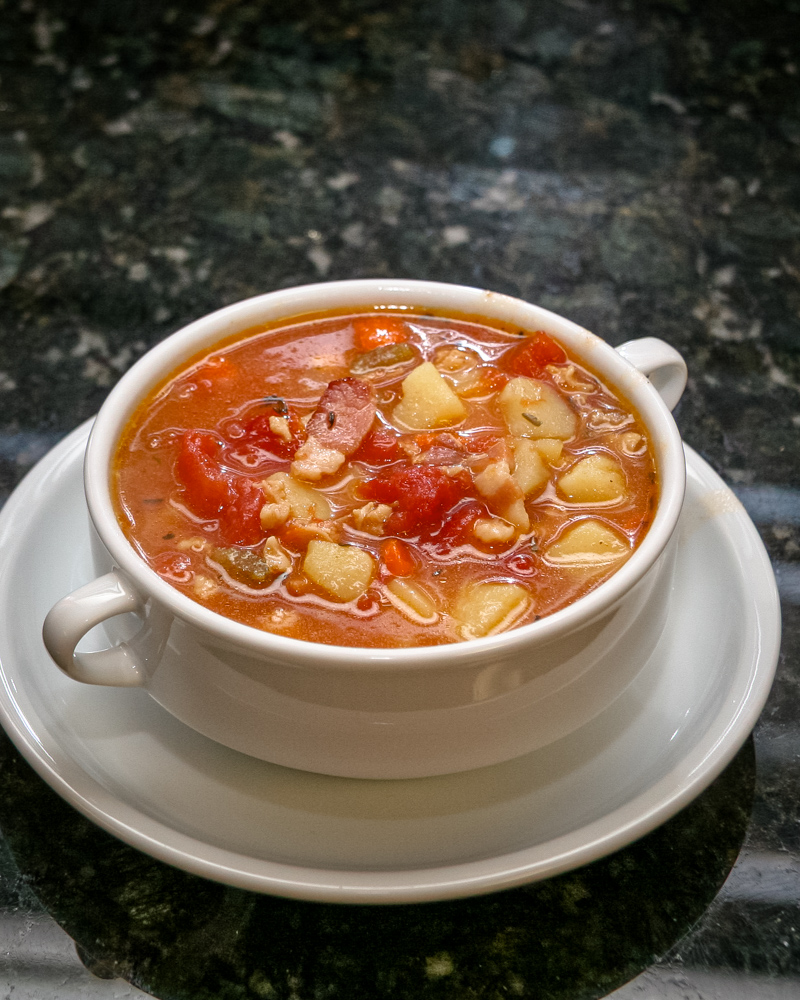 Manhattan clam chowder in a bowl.
