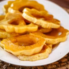 Glazed squash rings on a platter.