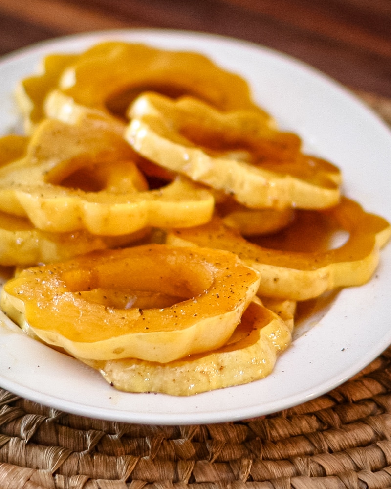 Glazed squash rings on a platter.