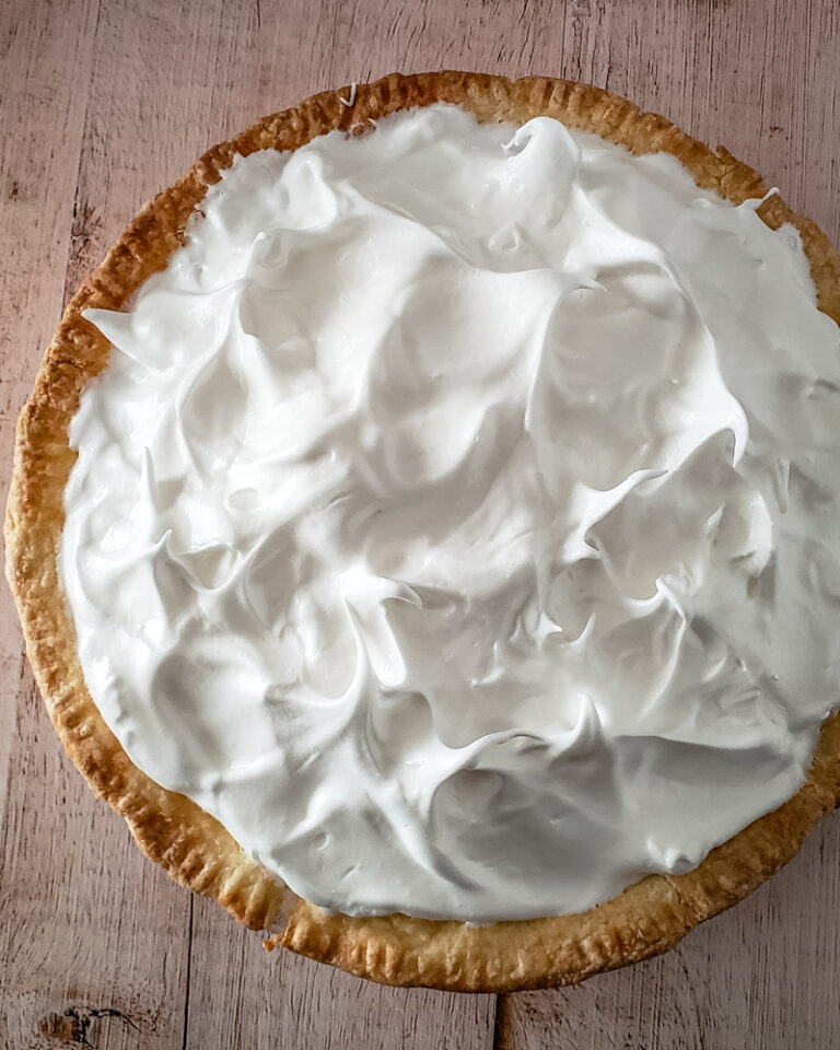 A pie topped with fluffy meringue.