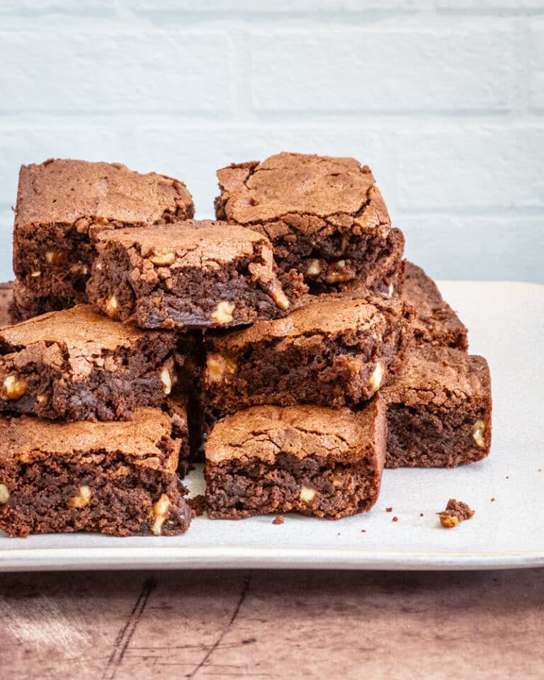 Brownies stacked on a plate