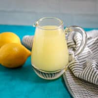 A small jug of lemon dessert sauce.