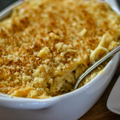 A pasta and cheese casserole in a baking dish