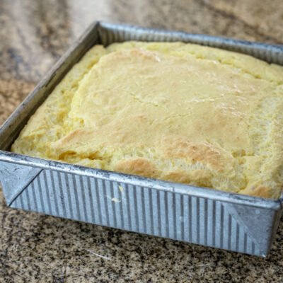 A pan of freshly baked southern spoonbread.