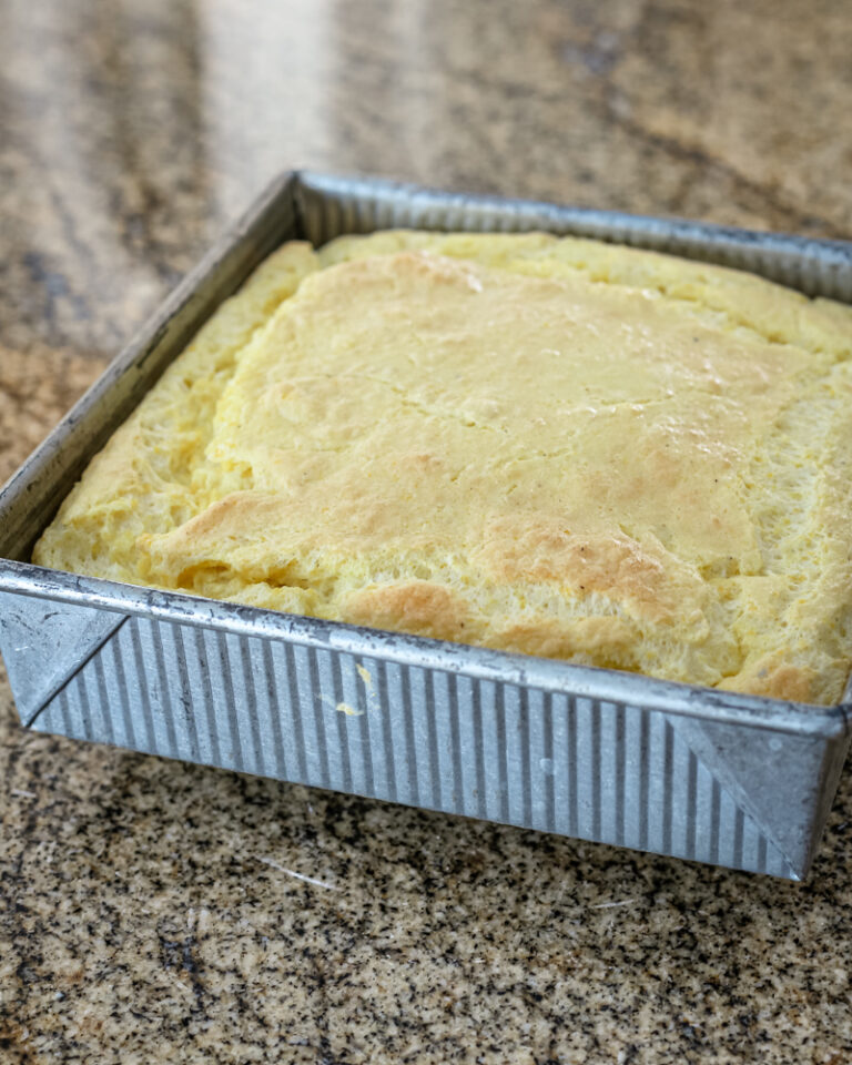 A pan of freshly baked southern spoonbread.