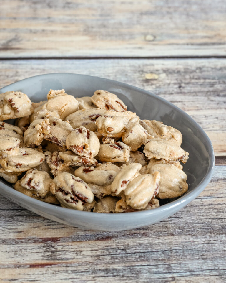Sugared pecans snack in a small decorative dish