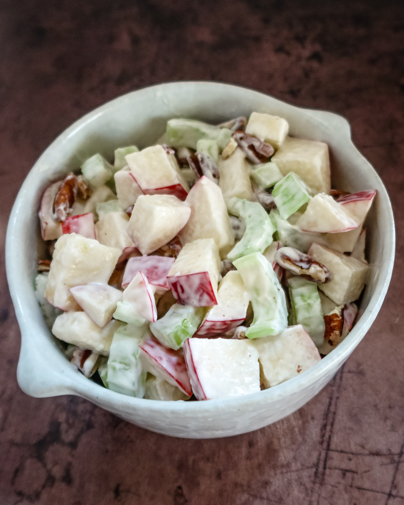A bowl of waldorf salad.