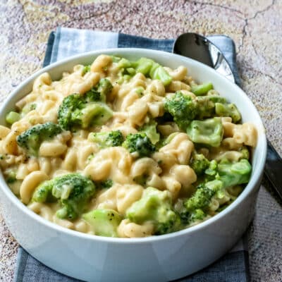 A bowl of broccoli mac and cheese.
